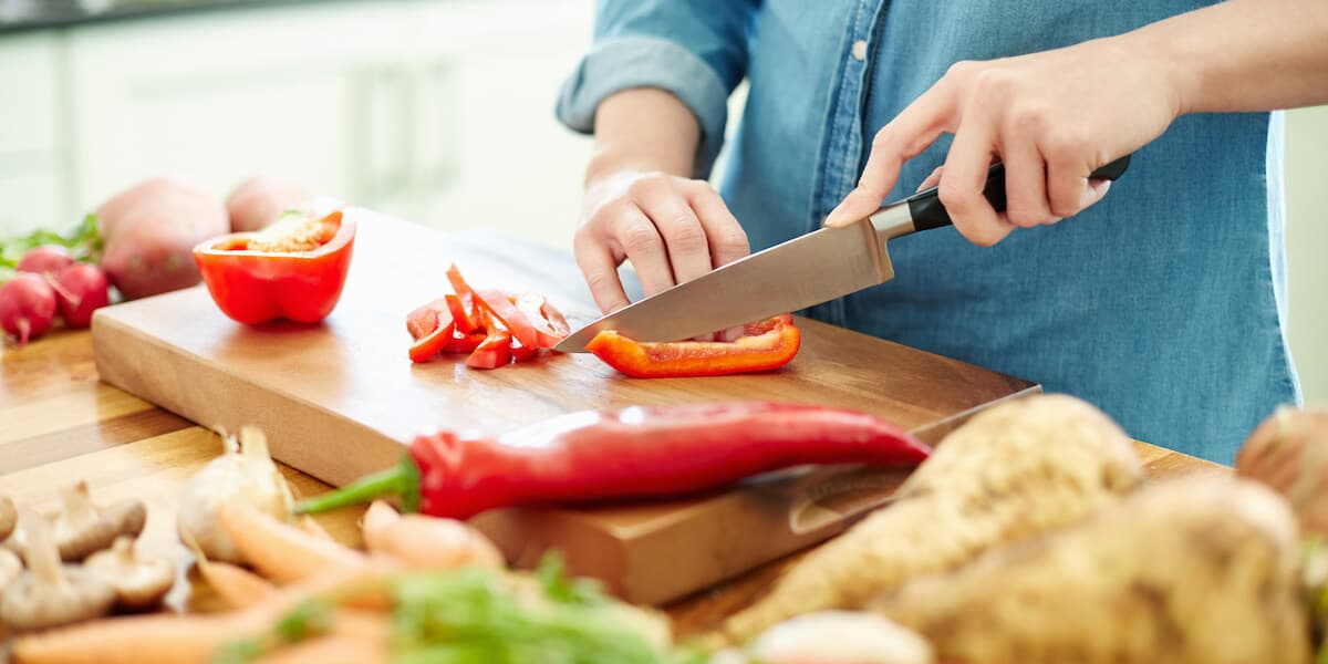 Chopping red bell pepper